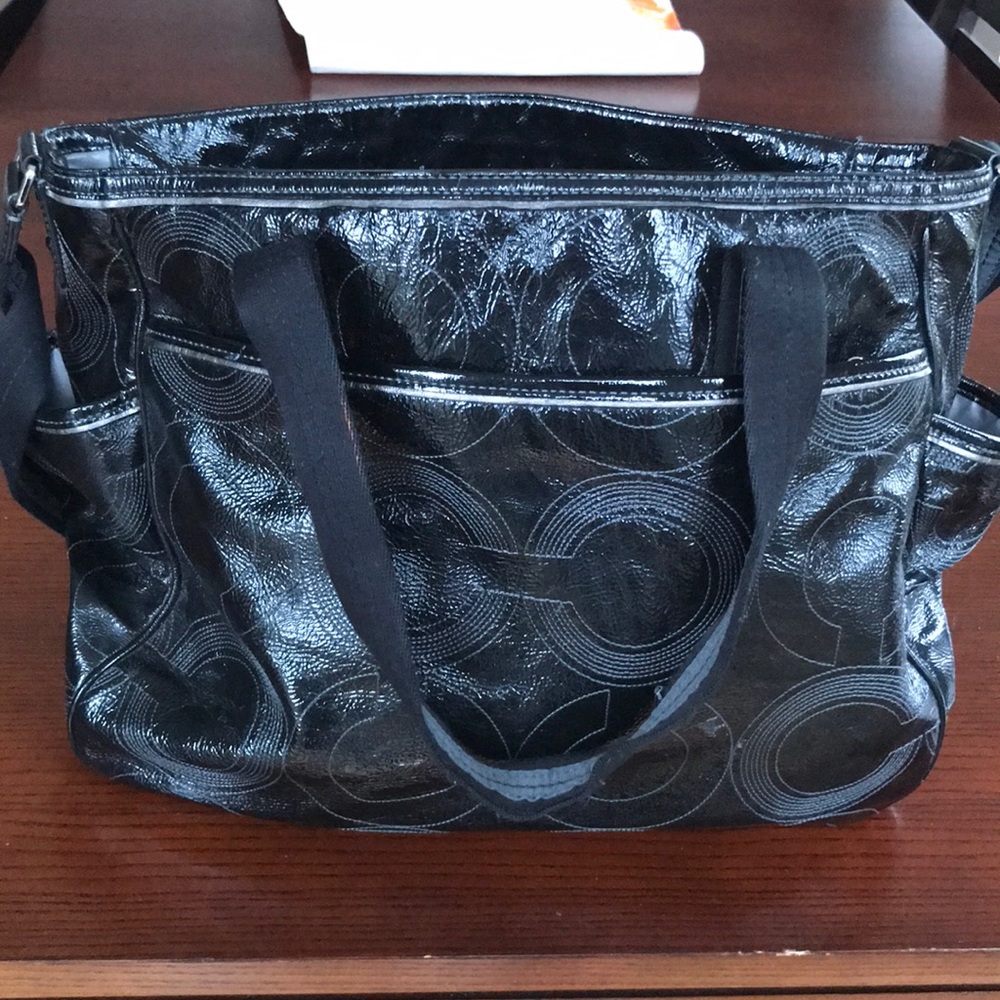 Coach diaper bag with changing pad